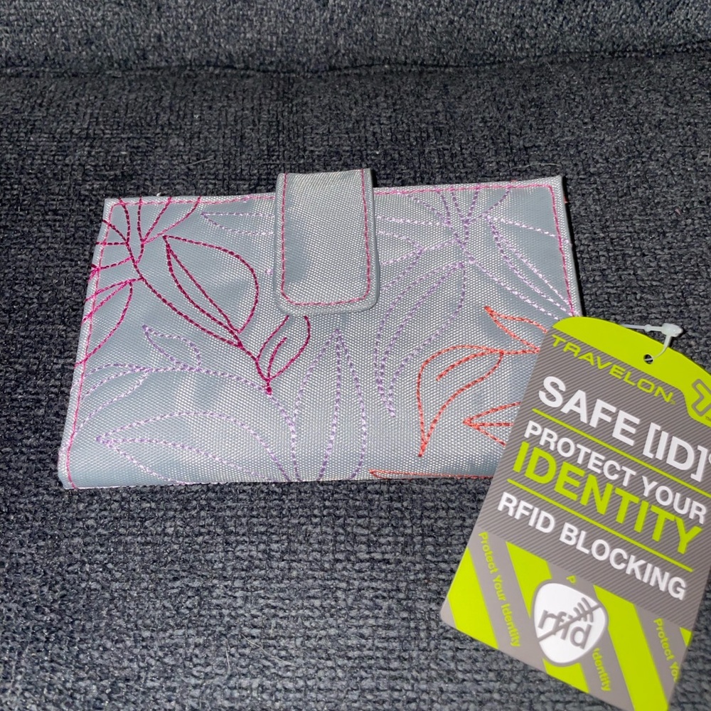 Travelon Anti Theft Tri Fold Red and Purple Wallet